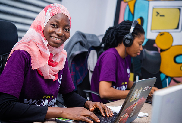 Woman in tech at a laptop
